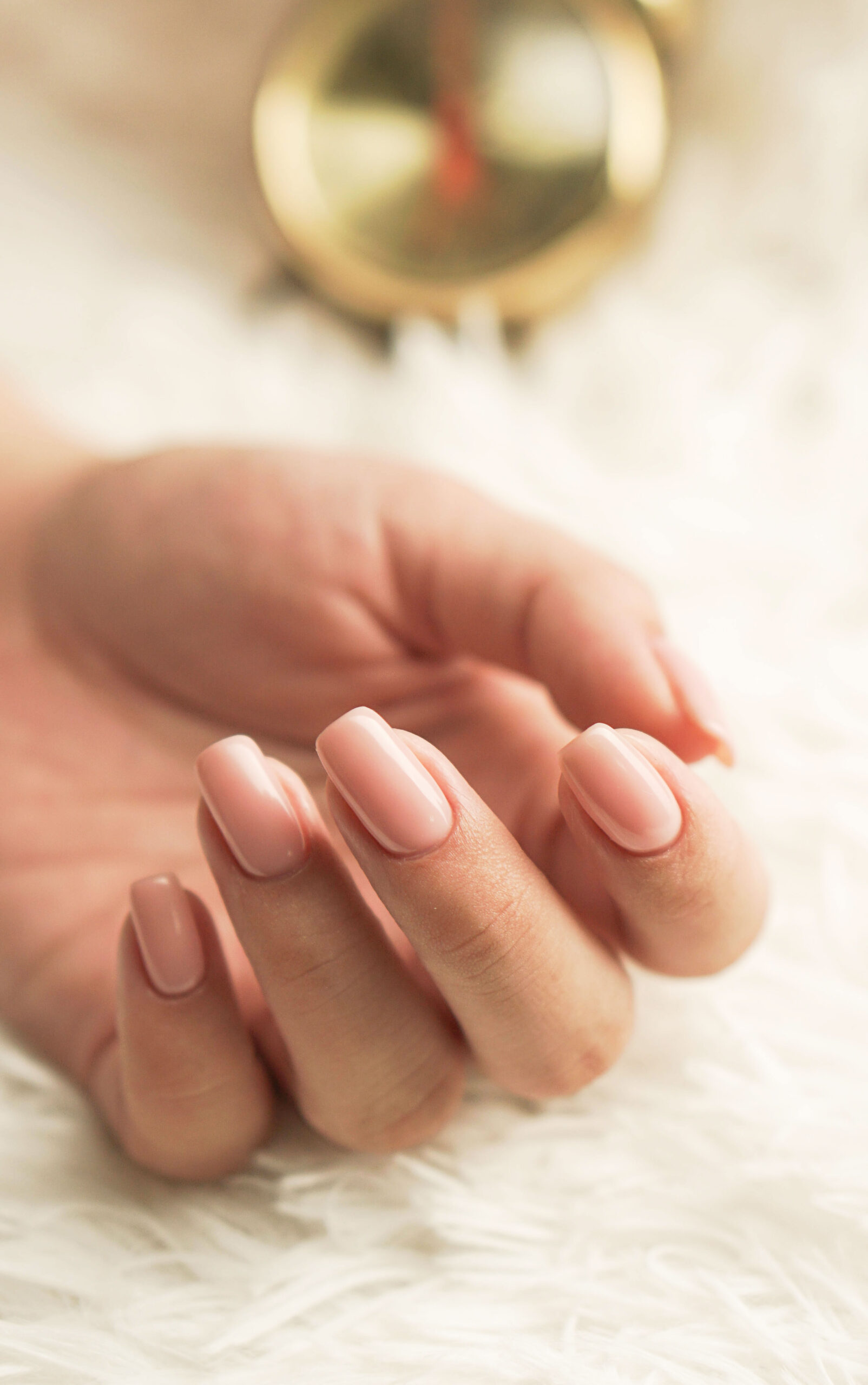 Woman's hand with manicured nails